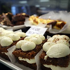 a selection of cakes and sweet treats from Bela Crema Bakery 