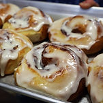 A tray of delicious iced cinnamon rolls from The Cini-Bun Shop