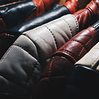 Leather Jackets hanging on display at Yiota Leathers
